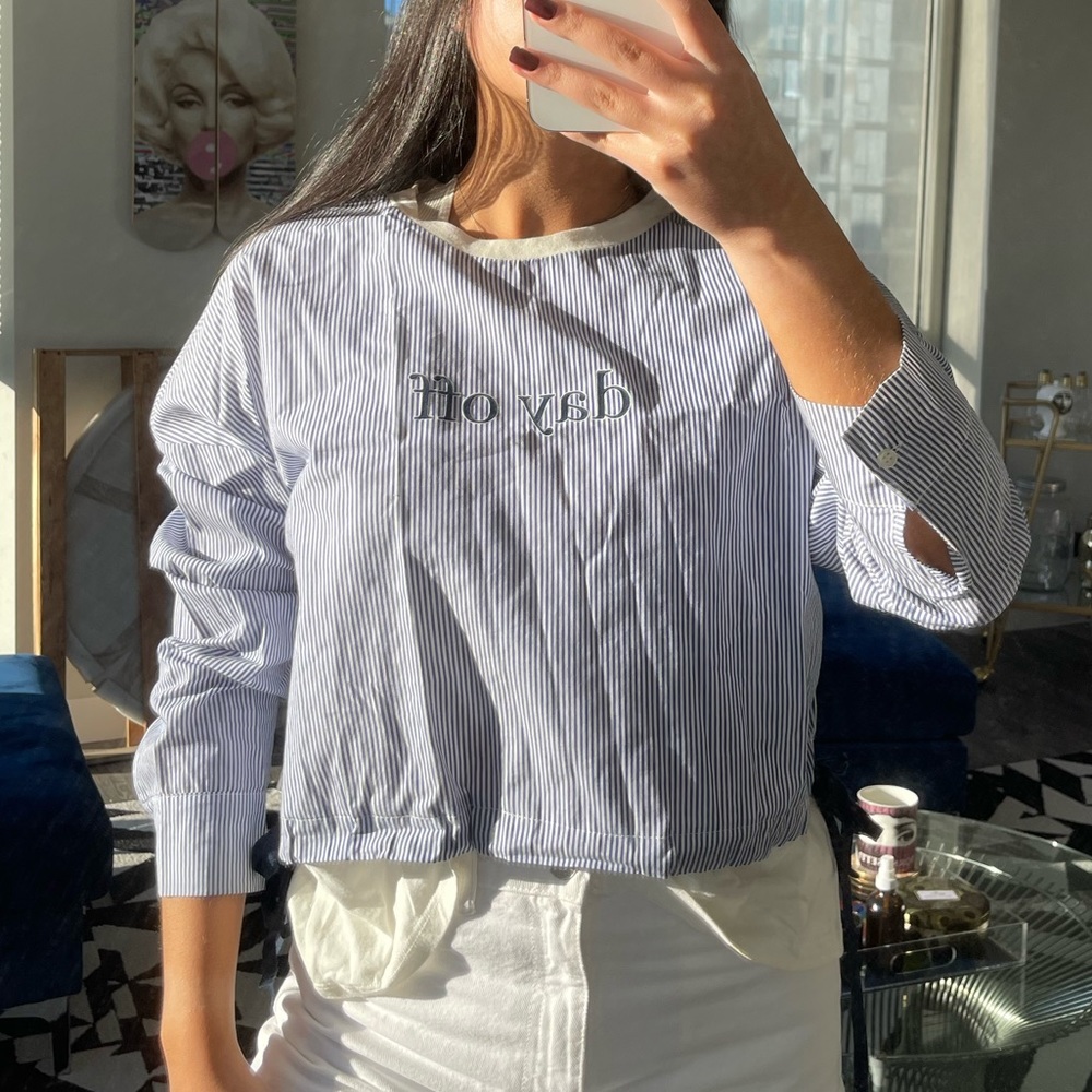 White & blue long sleeve quote